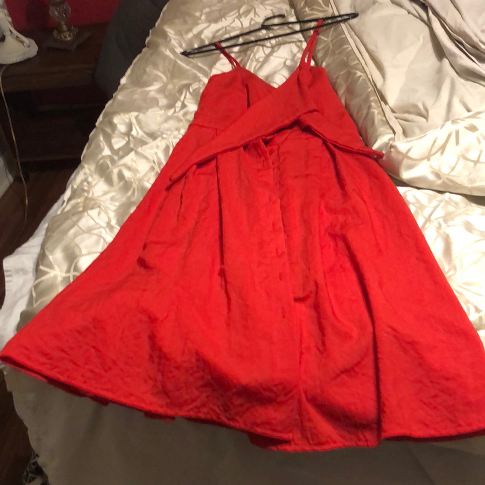 Brand new never worn summer dress. Coral in color and extremely cute!